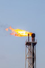 Fire on flare blow out in Offshore oil and Gas central processing platform and remote platform produced oil, natural gas and liquid condensate for set to onshore refinery from offshore in ocean sea.