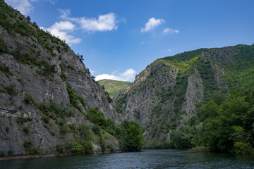 Fototapeta na wymiar Macedonia Canyon Matka Boat Ride in the valley in Summer