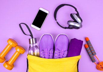 Creative flat lay of sport and fitness equipments