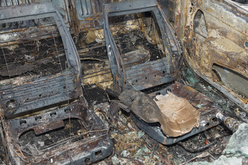 Interior of a burned out automobile ideal for insurance or crime and vandalism concepts