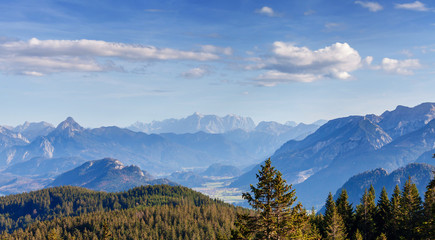 Fototapeta na wymiar Areal view from hillside at the magnificent Alps mountain range, Germany