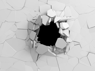 Dark destruction cracked hole in white stone wall