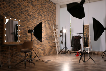 Interior of modern photo studio with professional equipment - obrazy, fototapety, plakaty
