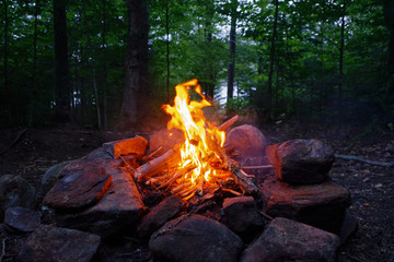 Campfire burning in the Adirondack Mountains. Essential Survival and Bushcraft skills