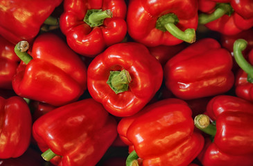Obraz na płótnie Canvas Pile of paprika peppers as background, closeup