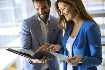 Young business people standing in the office