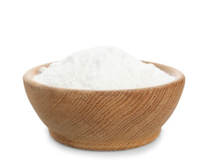 Wooden bowl with baking soda on white background