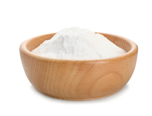 Wooden bowl with baking soda on white background