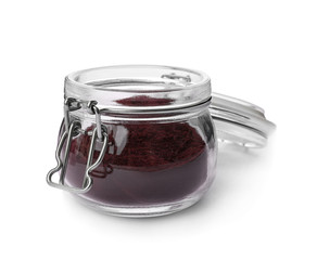 Jar with acai powder on white background