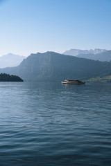 view of Lake Lucerne, the summer season, boats and ships, travel and vacation to Europe concept, Luzern, Switzerland, vertical photo