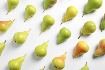 Ripe juicy pears on white background, top view - obrazy, fototapety, plakaty