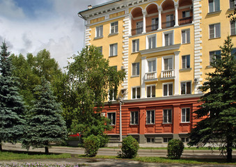 Fototapeta premium Old stone houses on the street of the town. Summer.