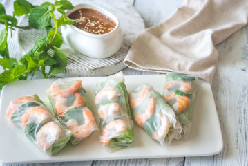 Shrimp rice paper rolls with peanut sauce