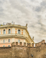 Fototapeta na wymiar Battlement and Buildings, Rome, Italy