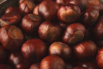 Ripe chestnuts closeup