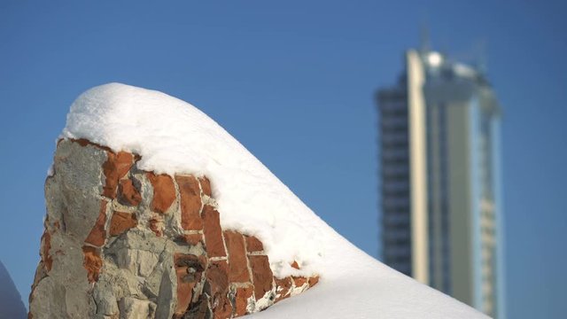 Skyscraper on the background of abandoned buildings, Social inequality