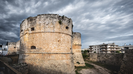 Fototapeta na wymiar castle tower dramatic sky - Otranto - Apulia - Italy