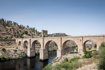 Fototapeta premium Roman bridge over the Tagus River in the city of Alcantara (Caceres, Spain)