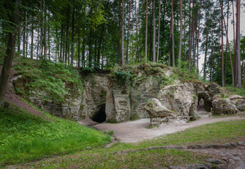 The cave. View of the Little Hell, Latvia. Landscape. Overall plan. Natural cave in sandstone rock....