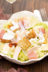 salad with chicken and smoked meat in beautiful bowl