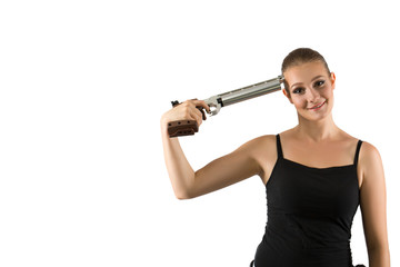 Young beautiful woman holding a sport gun on white background