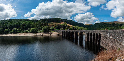 Fototapeta na wymiar Elan valley reservoirs in a dry and very hot summer time in the welsh countryside