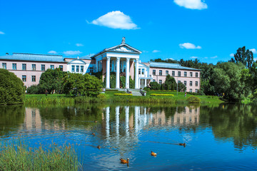 Fototapeta na wymiar Main building in Moscow Botanical Garden of Academy of Sciences