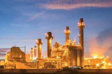 Oil and gas refinery industry Factory at twilight.