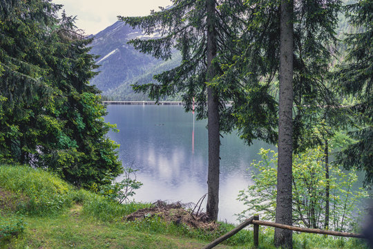 mountain lake surrounded by trees