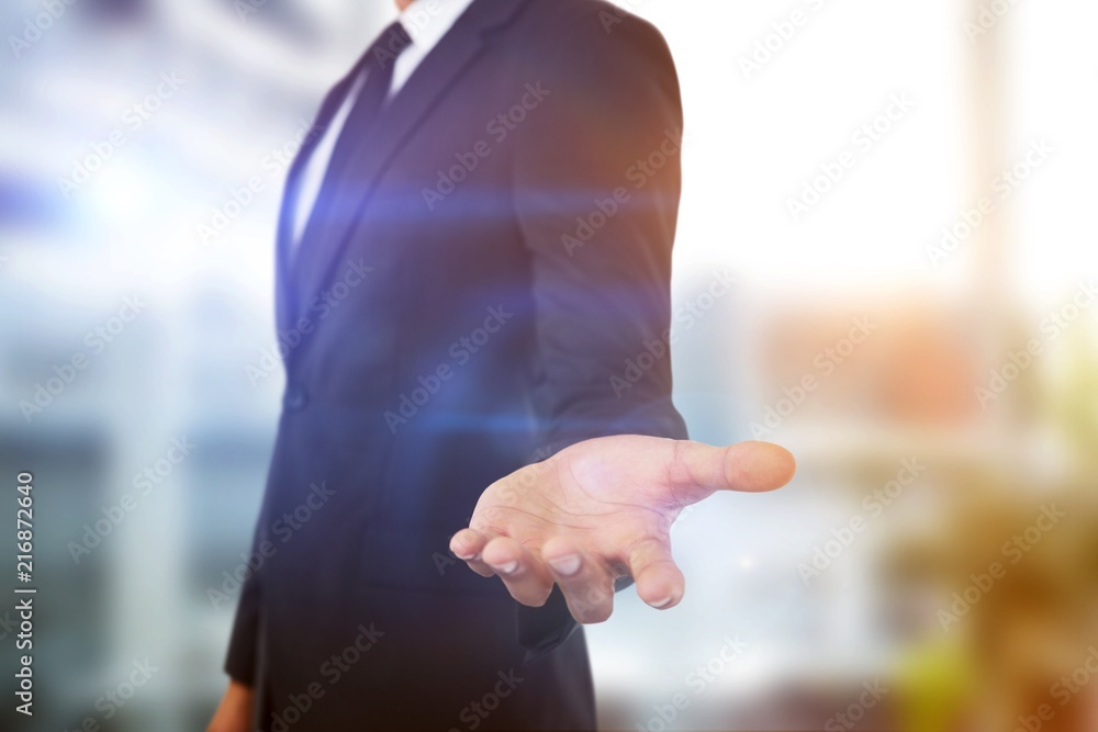 Poster composite image of midsection of businessman showing hand