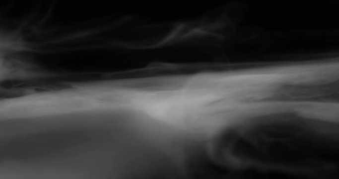 Twist and Misty Chaos. Heavy white smoke slowly spreads over the black surface gradually dissolving