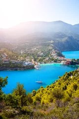 Foto op Canvas Assos village in morning light, Kefalonia. Greece. White lonely yacht in beautiful turquoise colored bay lagoon water surrounded by pine and cypress trees along the coastline © Igor Tichonow