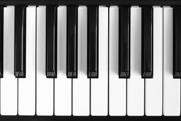 Naklejka premium Classical piano black and white keybord background