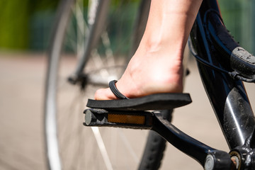 Riding a bike with flip flops