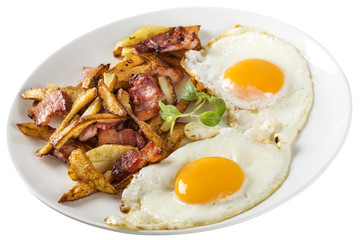 Homemade eggs with French fries and fried bacon on plate