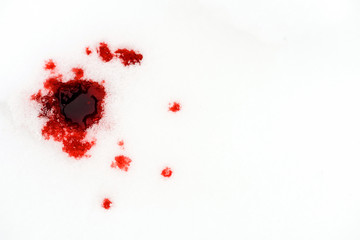 Blood Drops on White Snow Murder Background