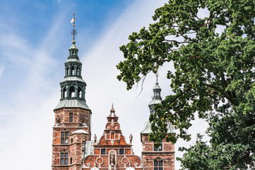Fototapeta premium Rosenborg Castle Gardens in Copenhagen, Denmark. Built in the Dutch Renaissance style in 1606, the castle was used by Danish regents as a royal residence.