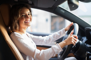Woman driving her car