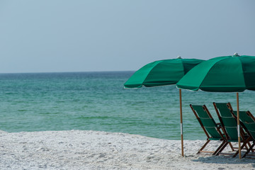 beach chairs and umbrella gulf coast Florida beach relaxation