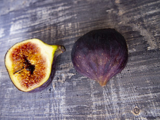 ripe figs on wood surface