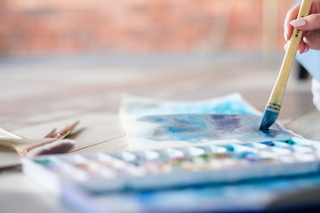 creative art lifestyle. drawing hobby and self expression. woman hand painting an abstract...