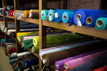 Variety of fabric bolts in shop