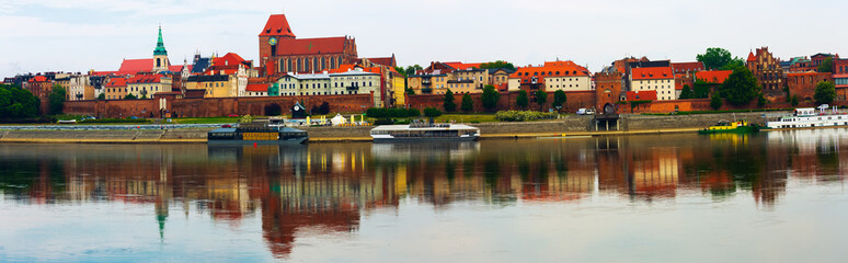 Obraz premium Panorama of Torun across Vistula river