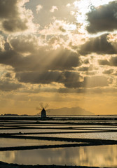 Sunset in the Natural reserve of the "Saline dello Stagnone", near Marsala and Trapani, Sicily.