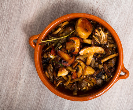  Image of delicious different mushrooms cooked at clay pot