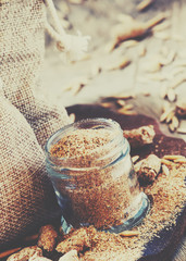 Healthy eating concept: oat bran, oat grain, ground oats, vintage wooden background, selective focus and toned image