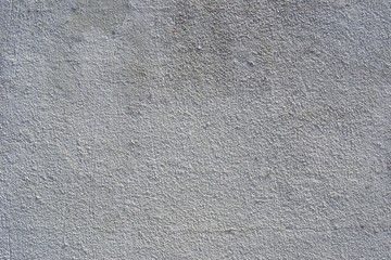 Closeup photograph of grungy plasterwork.