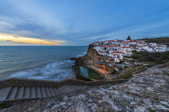 The Azenhas do Mar village at sunset in Portugal, Europe; Concept for travel in Portugal and most beautiful places in Portugal