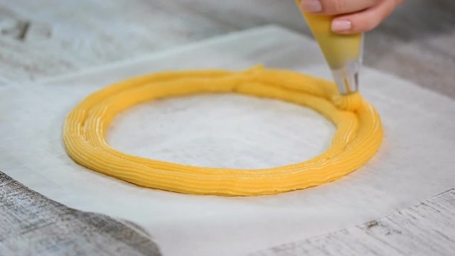 Eclair rings baking process. Making Paris Brest.