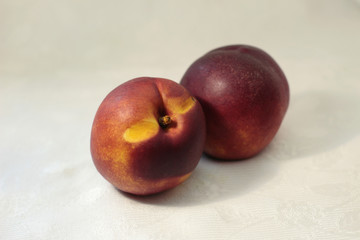 Portrait of peaches (nice composition) on white background. Concept: Fruit, nature, summer, juicy, juice